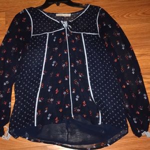 Navy blue top with floral pattern